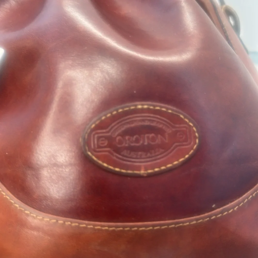 Oroton tan Molded cowhide Leather Drawstring bucket bag.